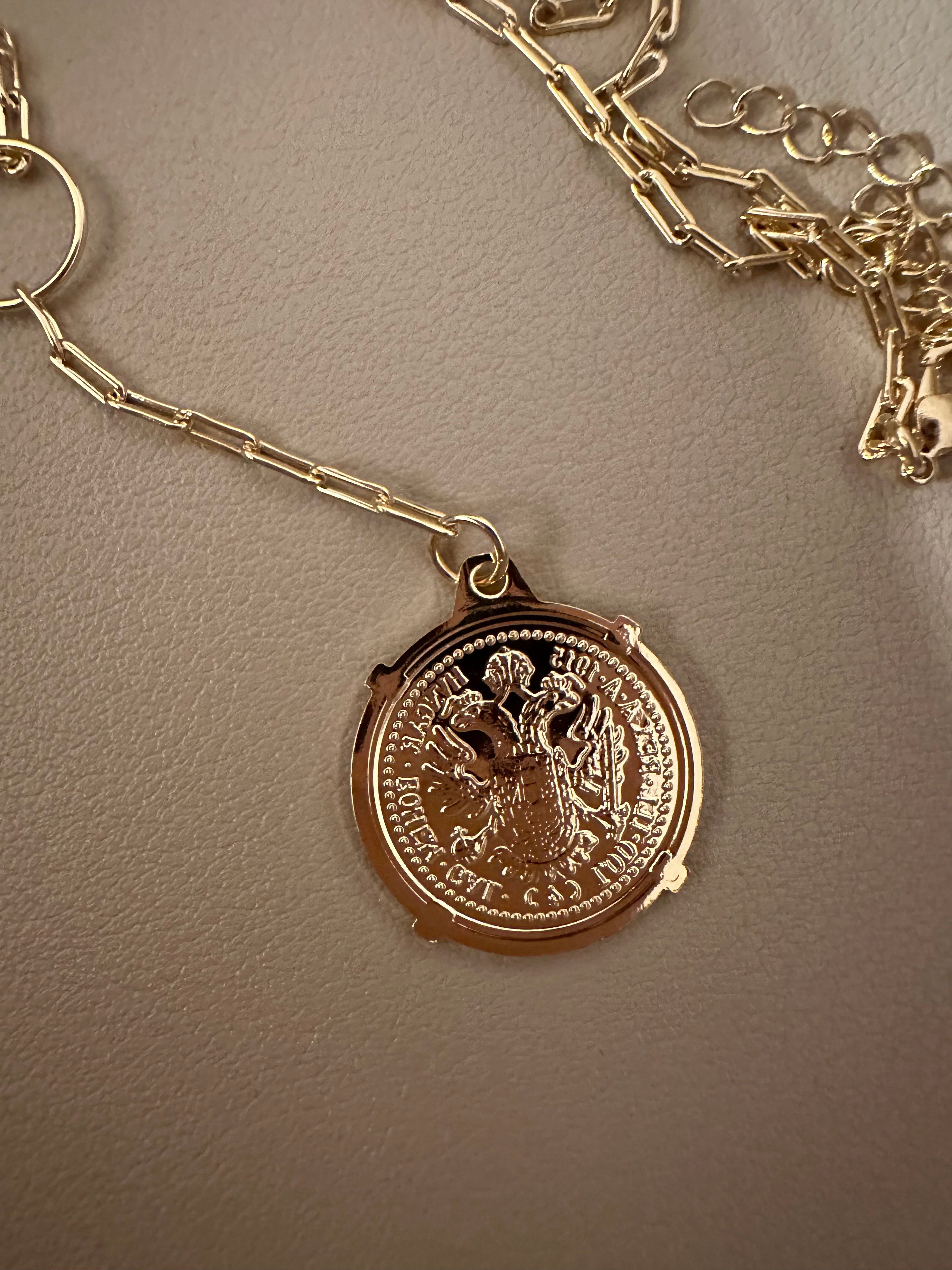 the sovereign coin necklace